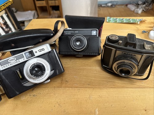 Three vintage film cameras - three,