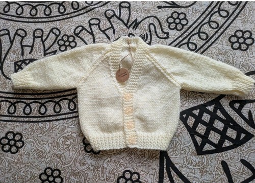 New hand knitted baby - hand,