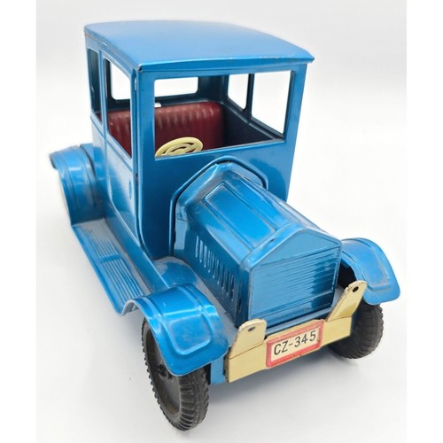 Vintage tin toy blue - sedan, car
