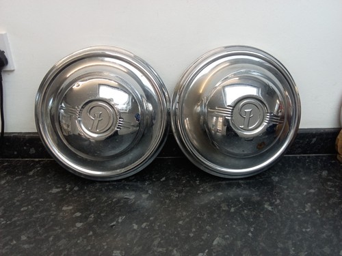 Daimler conquest hubcaps - daimler,