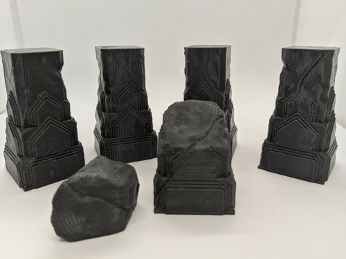 Carved stone pillars - carved,