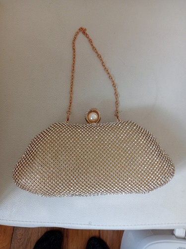 Women metallic clutch bag - metallic,