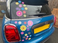 Multi coloured daisy stickers white outline