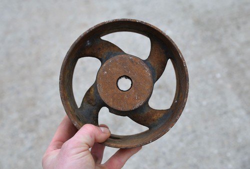 Old vintage cast iron wheel - iron,