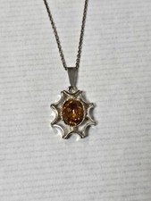 Small amber coloured 925 sterling pendant on chain necklace also marked 925
