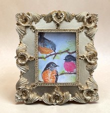“Three Robins on a Branch”
