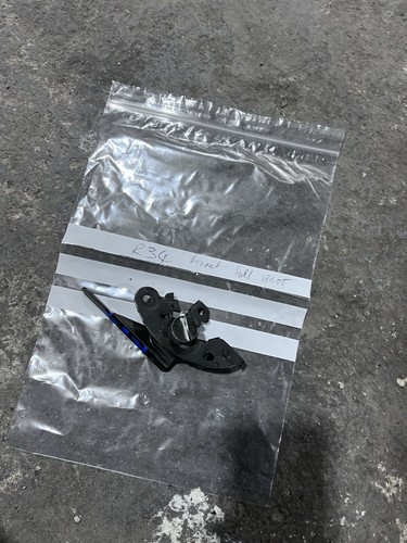 Boot lid fuel latch opening - /,