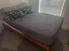 Wooden bed frame from IKEA