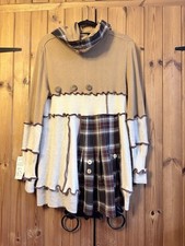 The Topian Den Tunic Top with