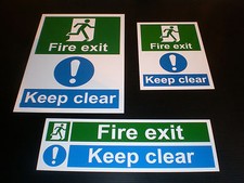 FIRE EXIT KEEP CLEAR sign or