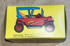 Miniature tin toy antique car