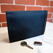 Black Canvas Ripper Trifold 1