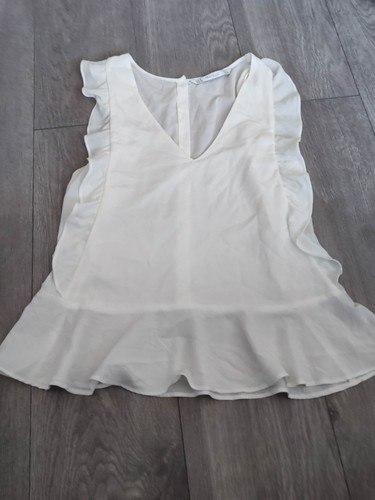 Zara white ruffled sleeveless - zara,