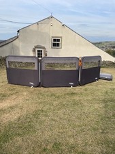 Vango Airbeam Modular 3 Panel Windbreak 4.8 metres Grey with translucent panels.
