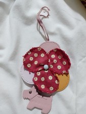 Radley large leather dog tag with fancy charm of leather circles