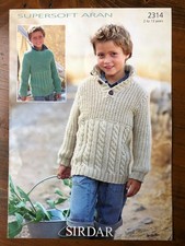 Sirdar 2314 knitting pattern child aran cable & fishermans rib sweaters