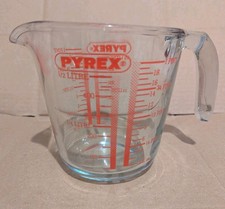 Pyrex half litre 1 pint glass measuring jug height 12cm red lettering 