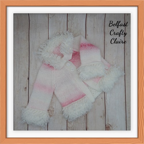Hand knitted baby loopy - hand,