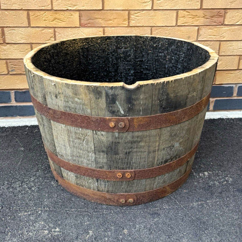 Weathered wooden half - wooden, barrel