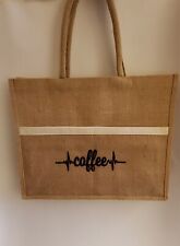 Jute upgraded shopping bag.  Lined front pocket - jute, embroidery coffee beat.