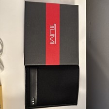 Tumi Black Leather Travel