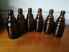 6 Empty Brown Glass Belgian