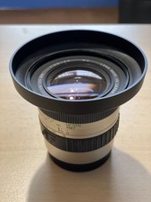 Cosina 19-35mm A/F lens in mint condition, A fit Boxed, with lens hood