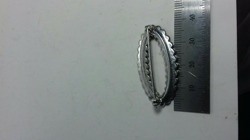Silver and marcasite brooch - and,