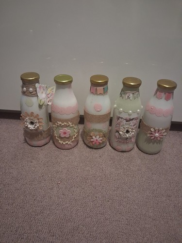 Milk bottles standing a - milk,