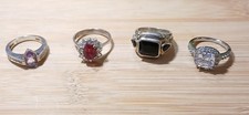 4 rings/ silver plated / varies styles &stones/ Various sizes ( listed below) GC