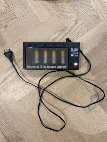Universal battery charger with - battery,