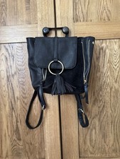 Primark Black Faux Leather Small Rucksack. Stitching On Front.