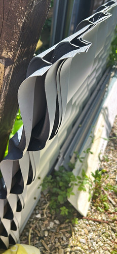 Corrugated grey metal roofing - metal,