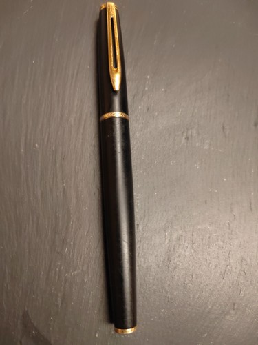 Black waterman roller ball - roller,