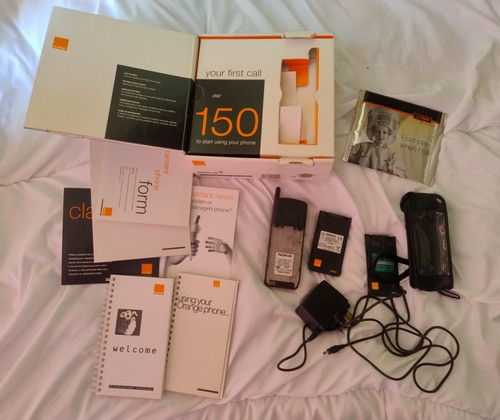 Old nokia orange mobile phone - old,