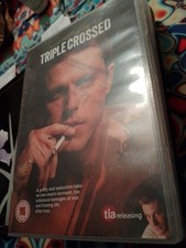 TRIPLE CROSSED. GAY INTEREST