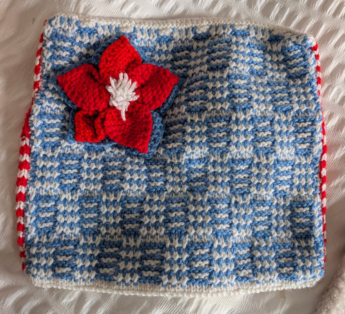 Hand knitted cushion cover