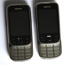 Two Nokia 6303ci Silver And Black Mobile Phones