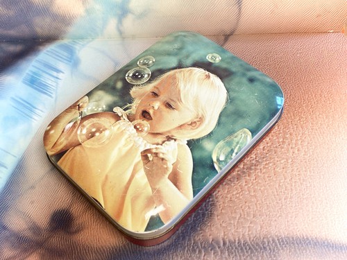 Girl blowing bubbles - , blue