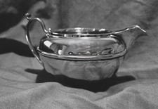 Solid silver cream jug