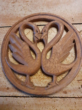 round carved wooden panel antique or vintage with swans