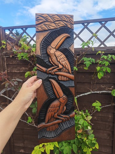 Hand carved wooden toucan - hand,