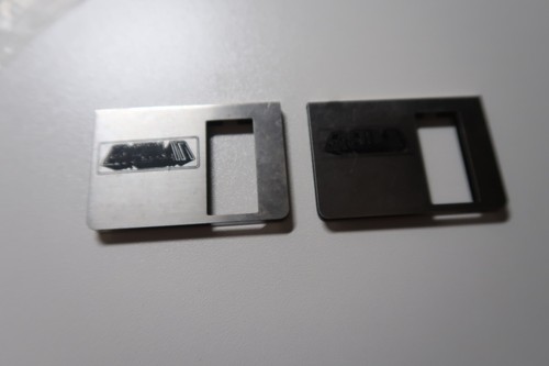 Gremlin branded metal disk - gremlin,