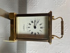 Beautiful Taylor and Bligh brass carriage clock with thick bevelled edge glass