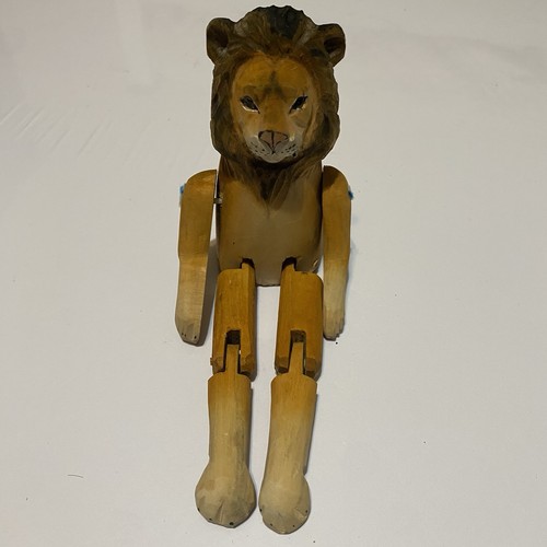 Hand carved wooden lion - hand,