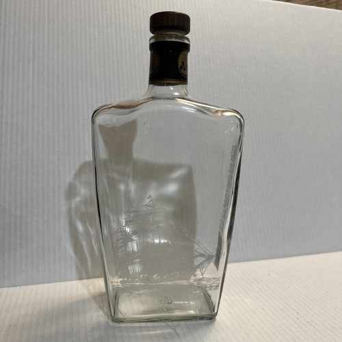 Clear empty alcohol bottle - clear,