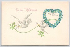 Doves Fly Forget Me Not Wreath