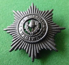 British Army Blackened Cap Badge - The Cheshire Regiment CHESHIRE