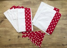 White with red spot on either