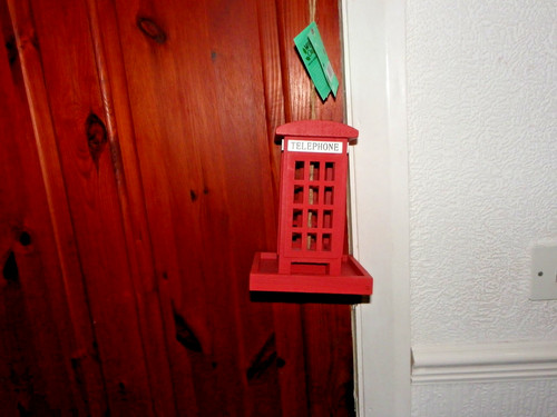 Red telephone phone - box, wild